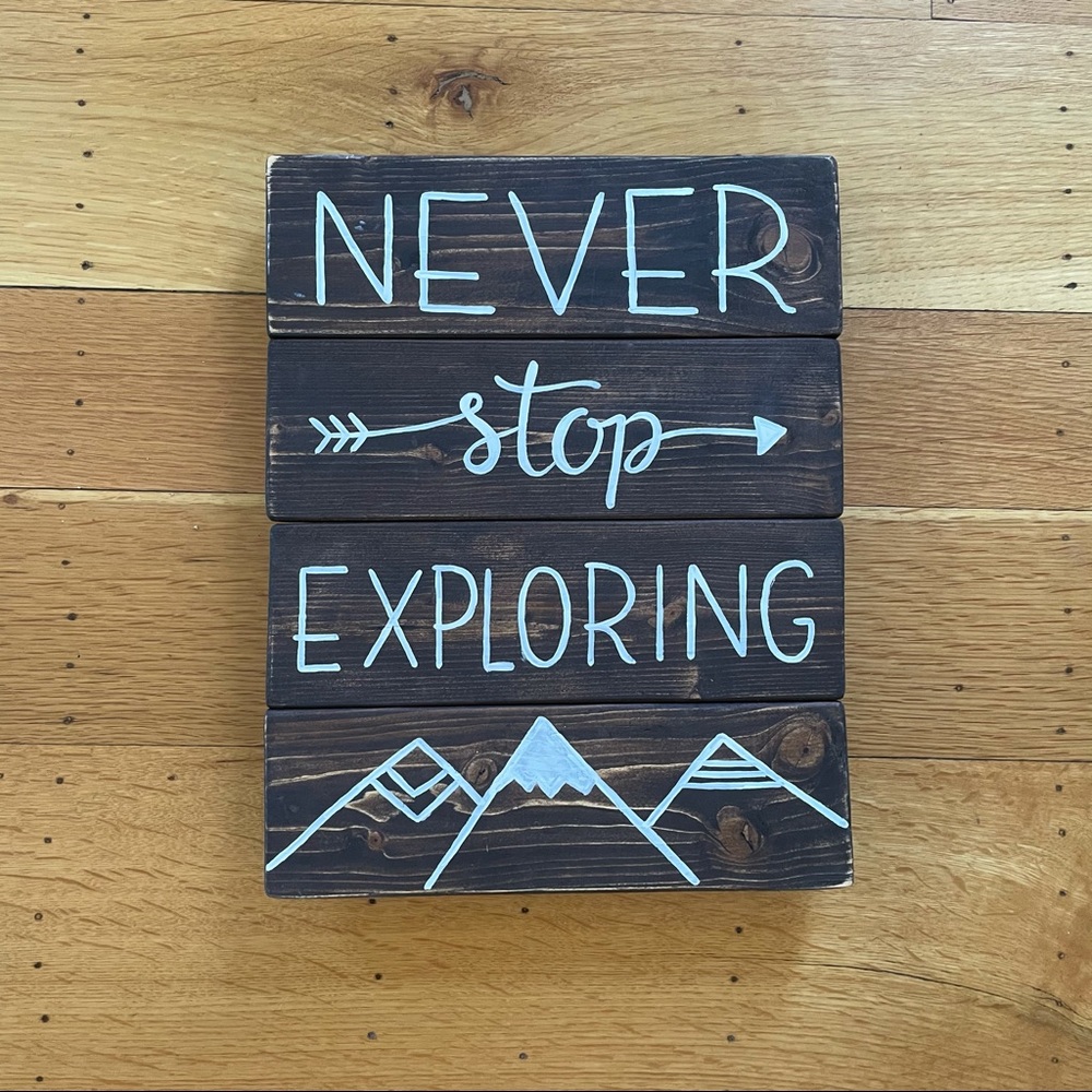 Never stop exploring sign